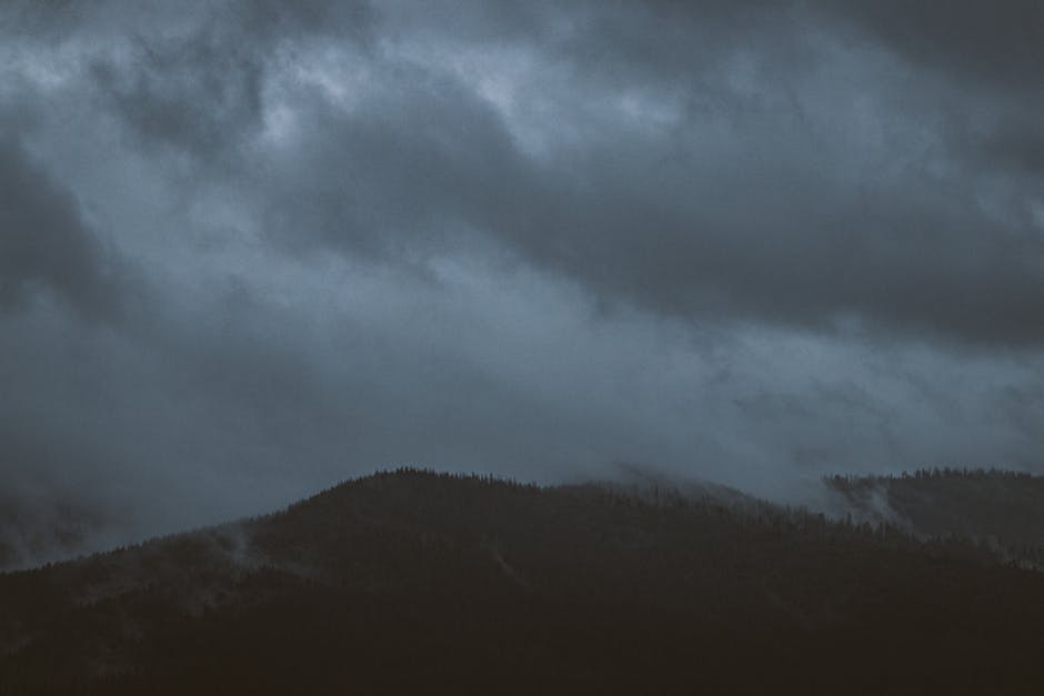 Spiritual meditation image: foggy mountains mist dark atmospheric